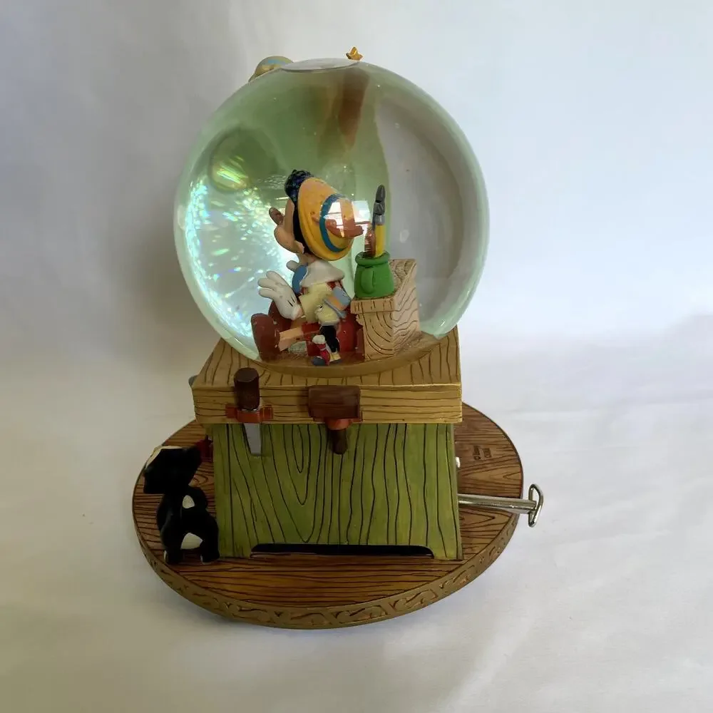 Disney‎ Pinocchio and the blue fairy snowglobe collectible plays 